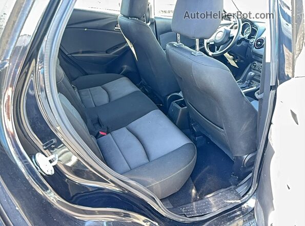 JM1DKBB71G0123172 2016 MAZDA CX-3 Black Вид салону спереду