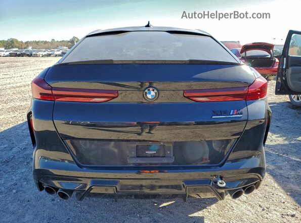 5YMCY0C05M9F21793 2021 BMW X6 Black Widok wnętrza z przodu