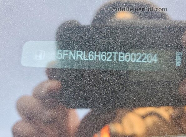 5FNRL6H62TB002204 2026 HONDA ODYSSEY White Вид наклейки з VIN-кодом