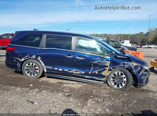 5FNRL6H66PB010103 2023 HONDA ODYSSEY Blue Widok wnętrza z tyłu