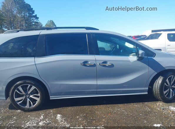 5FNRL6H86PB036430 2023 HONDA ODYSSEY Gray Widok wnętrza z tyłu