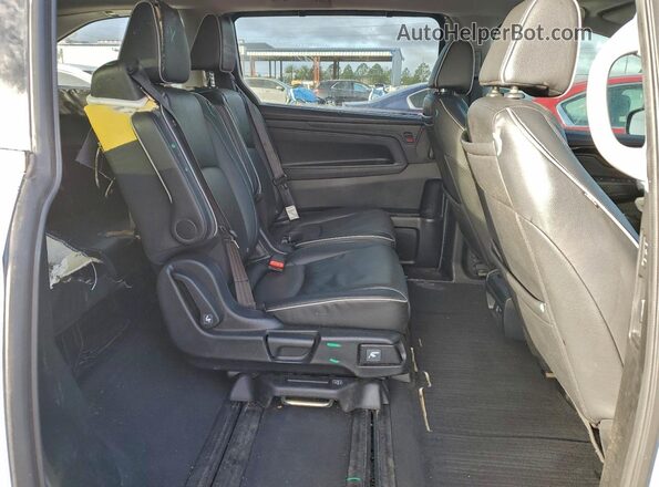 5FNRL6H98PB046174 2023 HONDA ODYSSEY Blue Rear interior view