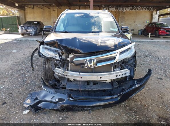 5FNYF6H02KB023924 2019 HONDA PILOT Black Rear interior view