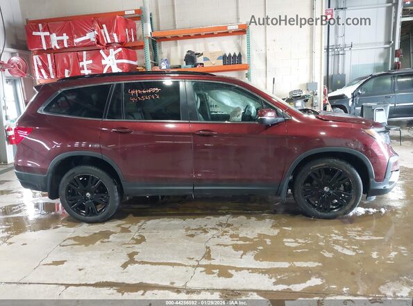 5FNYF6H28NB012206 2022 HONDA PILOT Burgundy Widok wnętrza z tyłu
