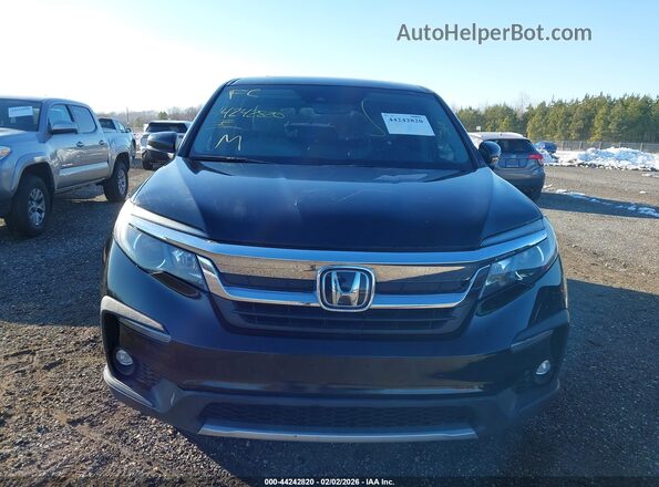 5FNYF6H56KB093051 2019 HONDA PILOT Black Вид задньої частини салону