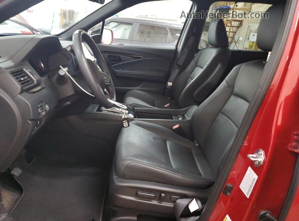 5FNYF8H03PB036443 2023 HONDA PASSPORT Red წინა სალონის ხედი