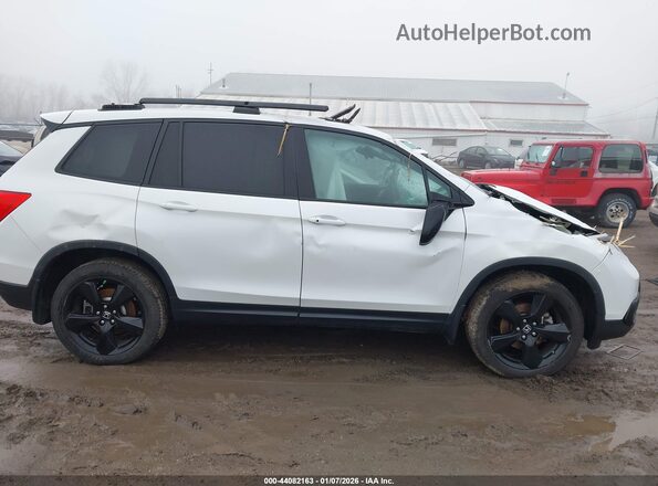 5FNYF8H06LB001048 2020 HONDA PASSPORT Белый Вид задней части салона