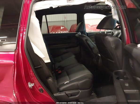 5FNYF8H50PB043667 2023 HONDA PASSPORT Burgundy Vista de la etiqueta del VIN