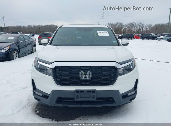 5FNYF8H55PB010258 2023 HONDA PASSPORT White Սարքավորումների վահանակի տեսք