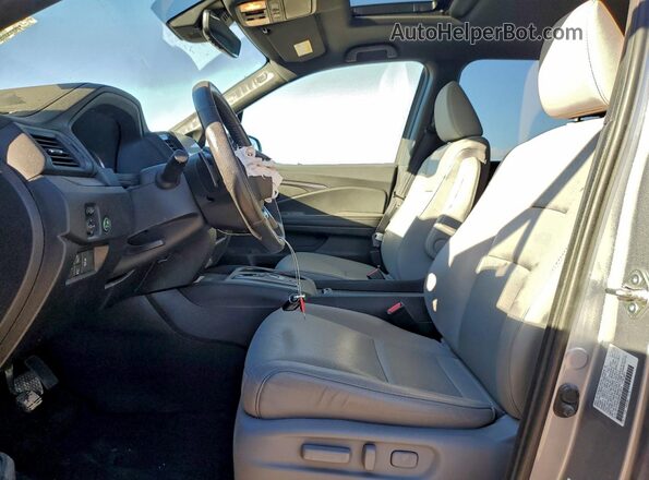 5FNYF8H58PB012814 2023 HONDA PASSPORT Серебряный Вид салона спереди