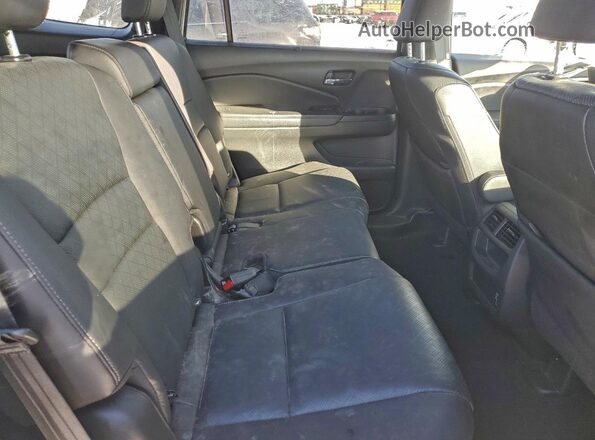 5FNYF8H59MB021890 2021 HONDA PASSPORT White Widok wnętrza z tyłu