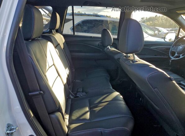 5FNYF8H60NB004552 2022 HONDA PASSPORT White Вид задньої частини салону