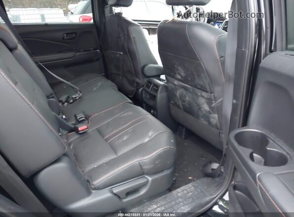 5FNYF8H65NB000657 2022 HONDA PASSPORT Black VIN კოდის სტიკერის ხედი