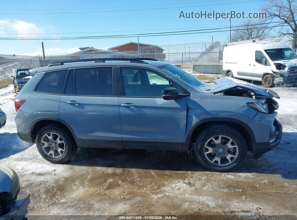 5FNYF8H68PB021277 2023 HONDA PASSPORT Blue Widok wnętrza z tyłu