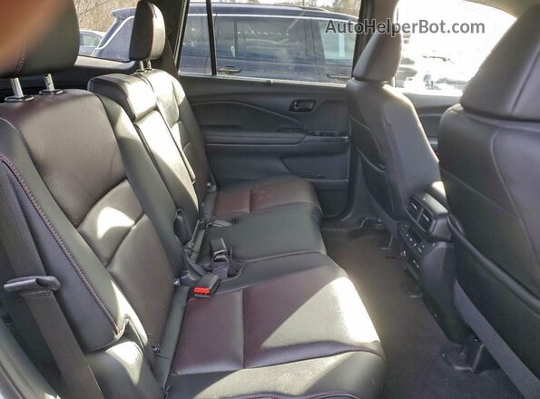 5FNYF8H81RB013770 2024 HONDA PASSPORT White Widok wnętrza z tyłu