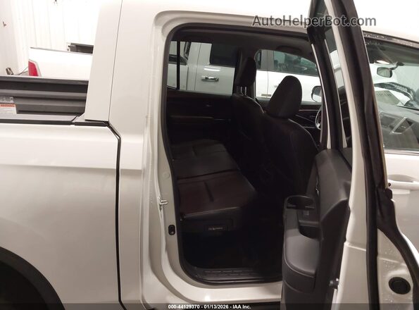 5FPYK3F51JB014081 2018 HONDA RIDGELINE White VIN կոդի պիտակի տեսք