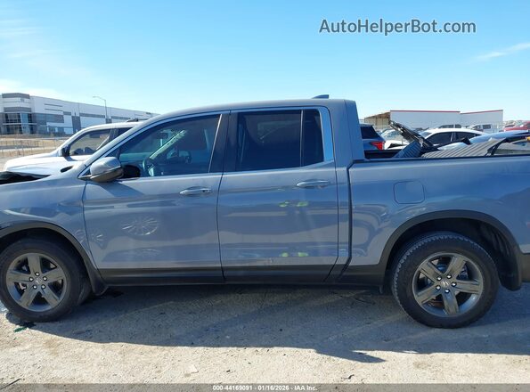 5FPYK3F53PB056485 2023 HONDA RIDGELINE Gray Rear interior view
