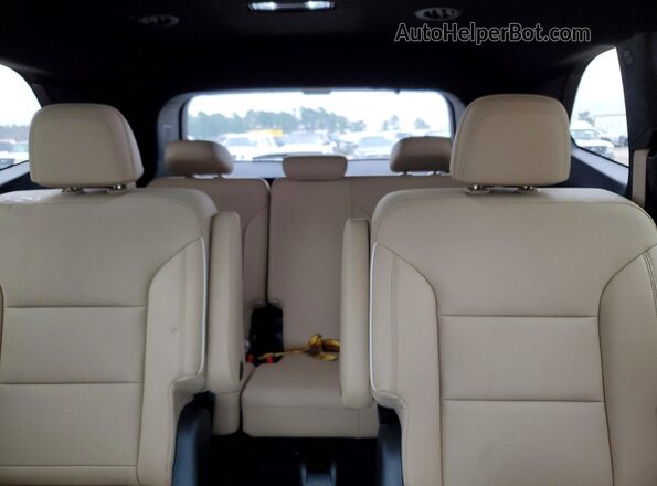 5GAERAKSXTJ126219 2026 BUICK ENCLAVE Burgundy Widok tylnych siedzeń