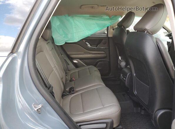 5LMCJ1DA2PUL19382 2023 LINCOLN CORSAIR Gray Vista interior trasera