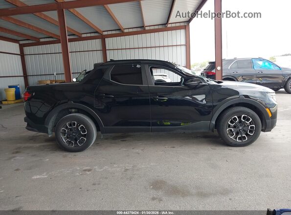 5NTJC4AE8NH003785 2022 HYUNDAI SANTA CRUZ Black Rear interior view