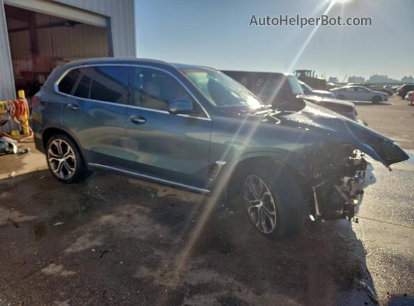 5UX13EU05S9Y43918 2025 BMW X5 Turquoise Front right