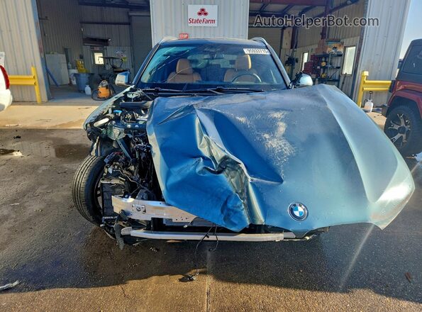 5UX13EU05S9Y43918 2025 BMW X5 Turquoise Front view