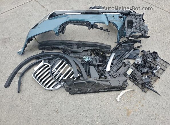 5UX13EU05S9Y43918 2025 BMW X5 Turquoise VIN sticker view