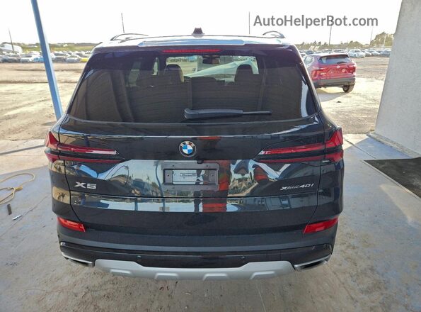 5UX23EU07R9U69309 2024 BMW X5 Black Rear view