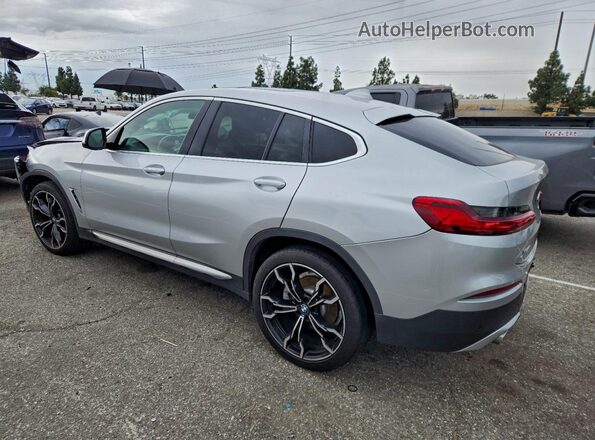 5UX2V1C03L9B28634 2020 BMW X4 Серебряный Задняя левая четверть