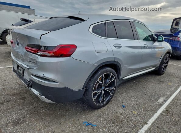 5UX2V1C03L9B28634 2020 BMW X4 Серебряный Задняя правая четверть