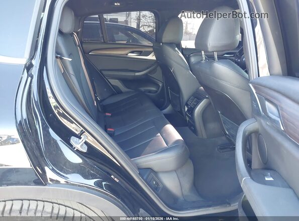 5UX2V1C08M9H06874 2021 BMW X4 Black 