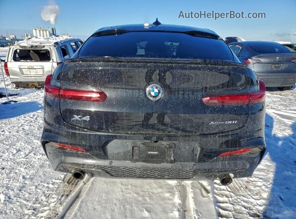 5UX2V1C08M9H97242 2021 BMW X4 Black უკანა ხედი