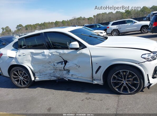 5UX33DT02P9N55057 2023 BMW X4 White Սալոնի հետևի տեսք