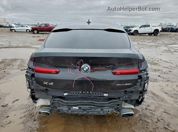 5UX33DT07R9V04043 2024 BMW X4 Black Vista trasera