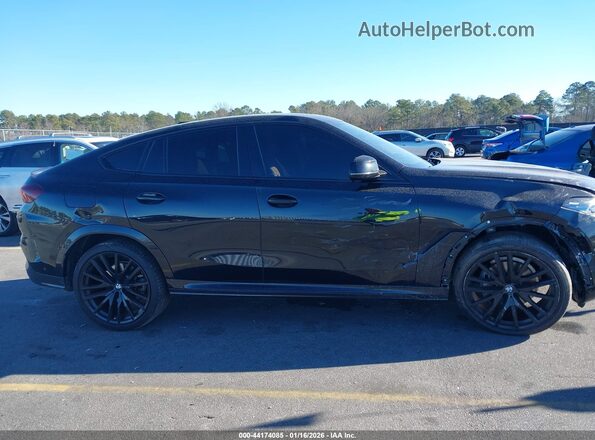 5UX33EX01S9X93832 2025 BMW X6 Black Вид задньої частини салону