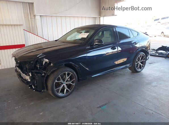 5UX33EX02R9U97955 2024 BMW X6 Dark Blue Vista tres cuartos delantera izquierda