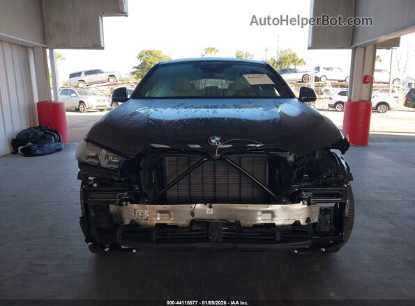 5UX33EX02R9U97955 2024 BMW X6 Dark Blue Vista interior trasera