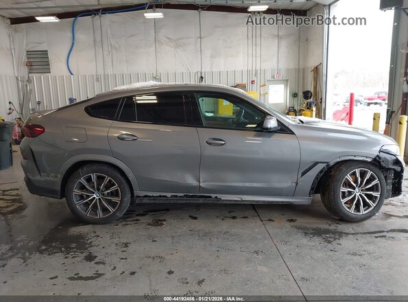5UX33EX05S9Z55414 2025 BMW X6 Gray Սալոնի հետևի տեսք