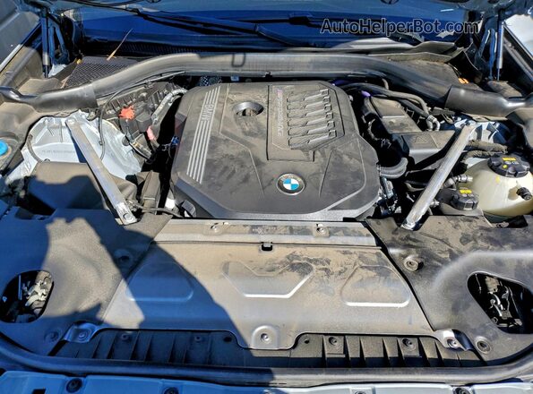 5UX43DT04P9P70850 2023 BMW X4 Gray Vista interior trasera