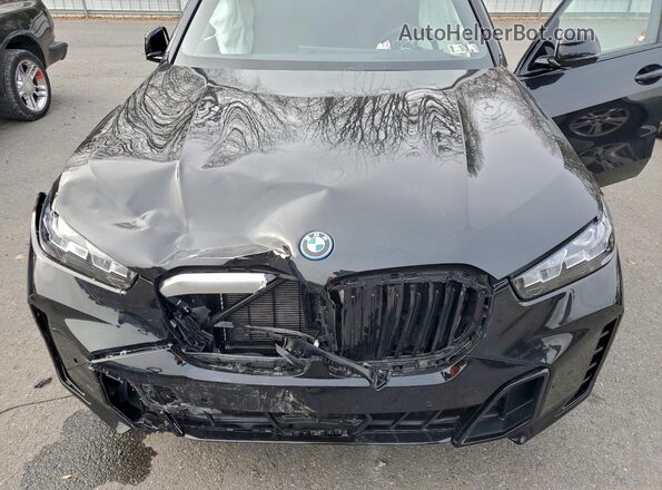 5UX43EU05T9026396 2026 BMW X5 Black Vista interior trasera