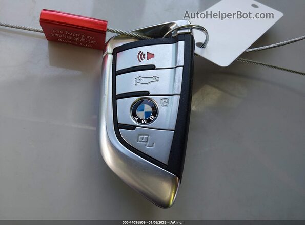 5UXCW2C00L9C79356 2020 BMW X7 Черный Вид панели приборов