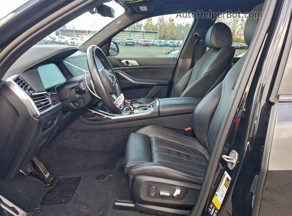 5UXCW2C01N9M30821 2022 BMW X7 Black Widok wnętrza z przodu