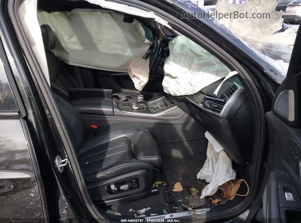 5UXCX6C0XL9B81648 2020 BMW X7 Черный Вид салона спереди