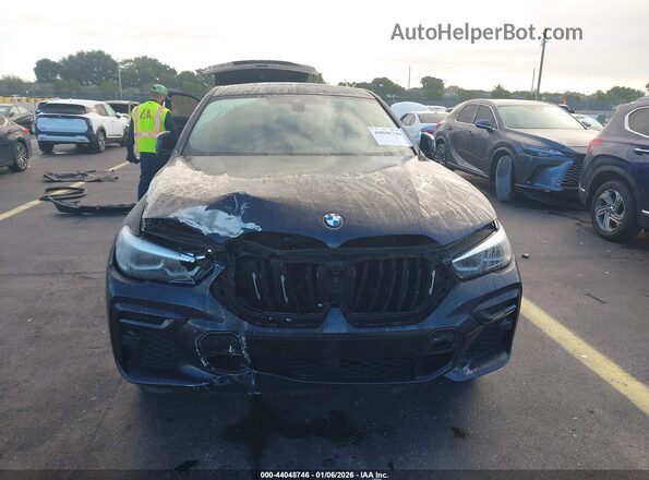 5UXCY6C04P9R58079 2023 BMW X6 Black Widok z przodu