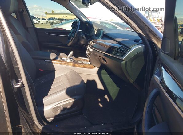 5UXKT0C53G0S76091 2016 BMW X5 Черный Вид салона спереди