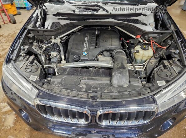 5UXKU2C39H0U29890 2017 BMW X6 Blue Vista del compartimento del motor