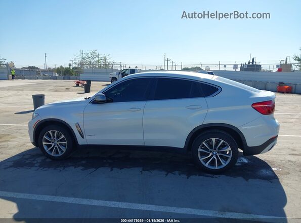 5UXKU2C50J0X49638 2018 BMW X6 White Вид задньої частини салону