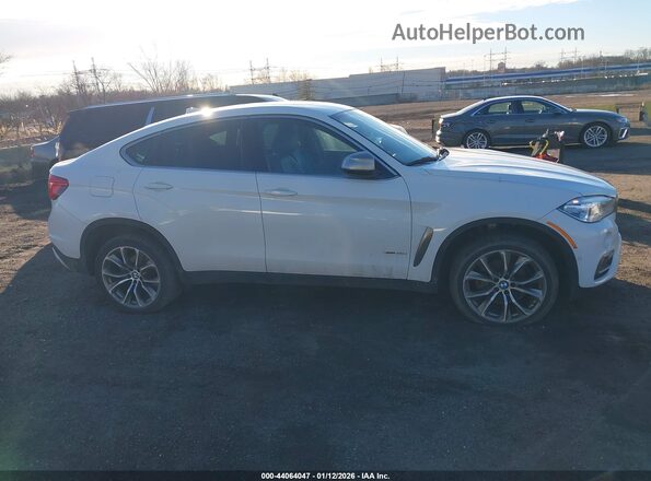 5UXKU2C55J0X50977 2018 BMW X6 White Rear interior view