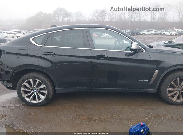 5UXKU2C56J0X50020 2018 BMW X6 Черный Вид задней части салона