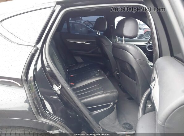 5UXKU2C56J0Z62089 2018 BMW X6 Black VIN sticker view